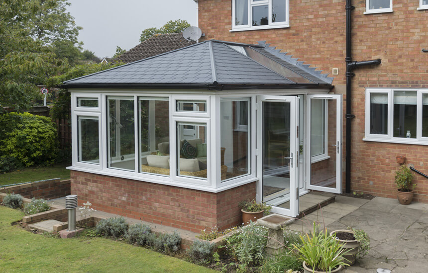 uPVC Edwardian conservatory with a tiled roof