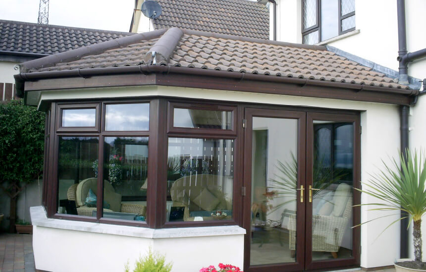 Victorian sunroom with a tiled roof